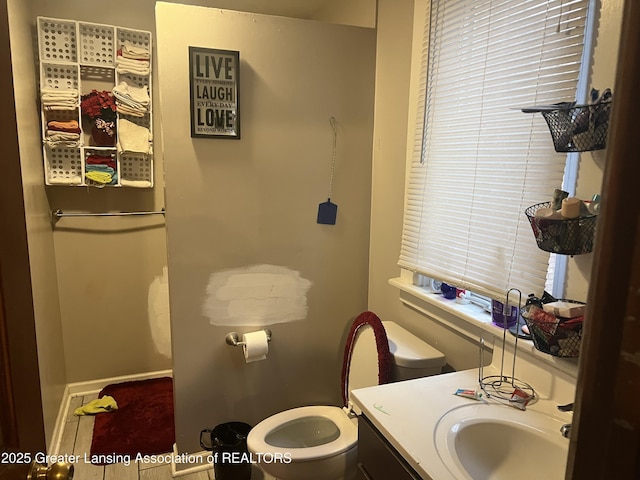 bathroom with vanity and toilet