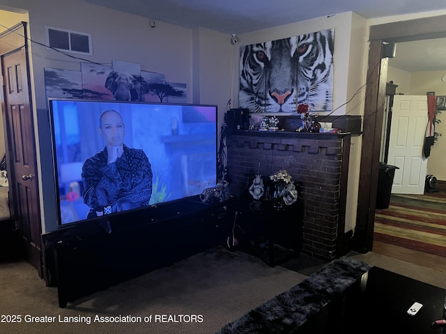 interior details with a brick fireplace