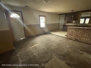 interior space with dark brown cabinetry