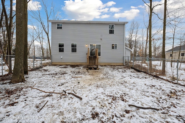 view of snow covered house