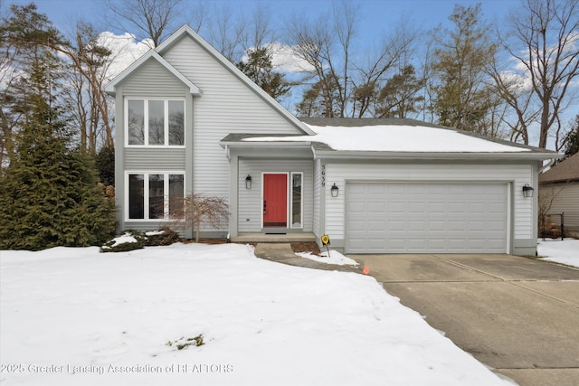 view of front of property with a garage