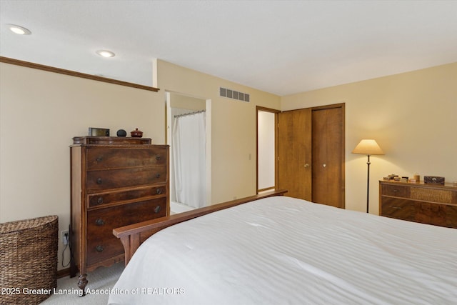 carpeted bedroom featuring a closet