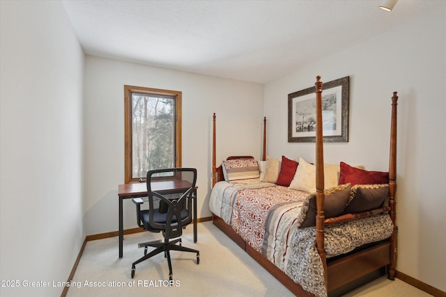 bedroom featuring light carpet