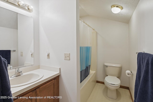 full bathroom featuring shower / bath combo, tile patterned flooring, vanity, a textured ceiling, and toilet