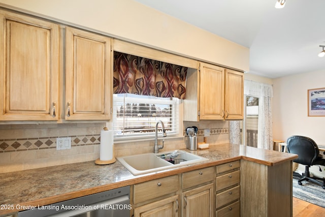 kitchen with sink, light hardwood / wood-style flooring, light brown cabinets, dishwasher, and decorative backsplash