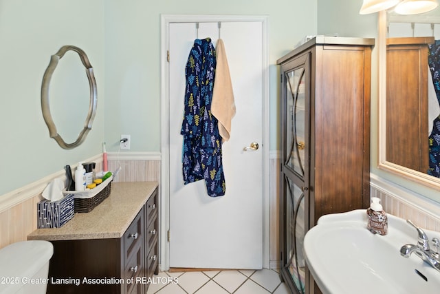 bathroom featuring sink and toilet