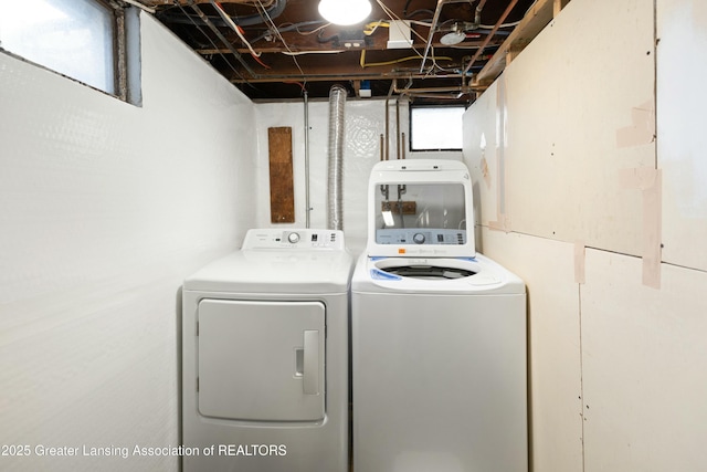 washroom with separate washer and dryer