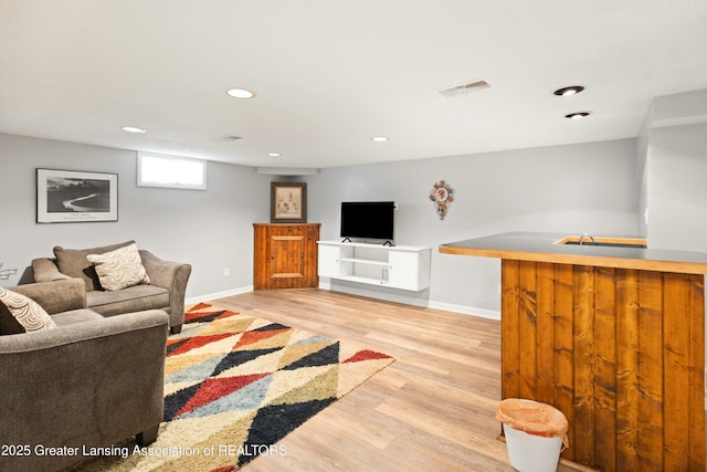 living room featuring light hardwood / wood-style flooring