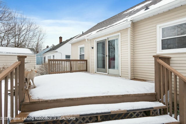 view of snow covered deck