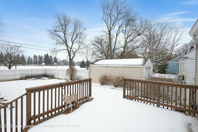 view of snow covered deck