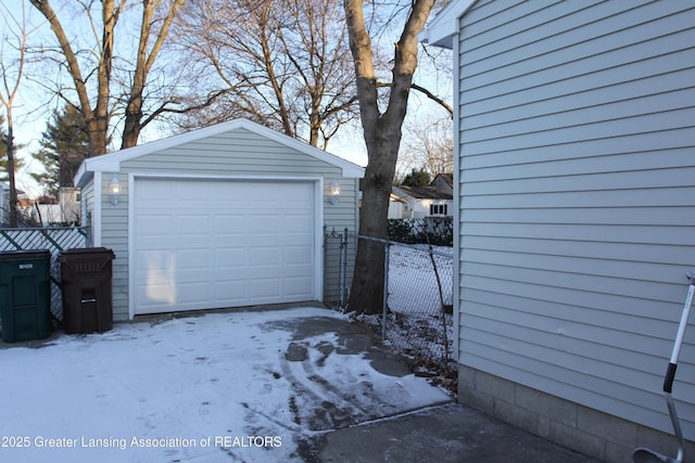 view of snow covered garage