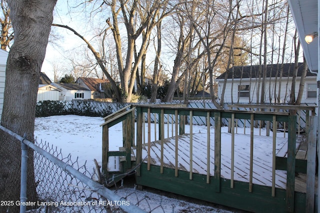 view of snow covered deck