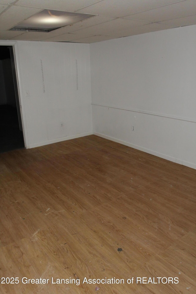 spare room with hardwood / wood-style flooring