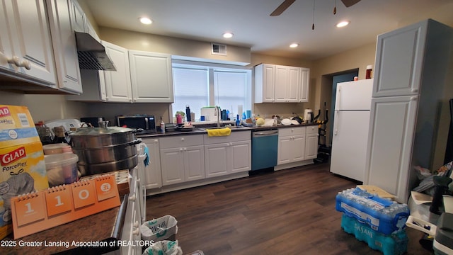 kitchen featuring sink, stainless steel appliances, white cabinets, and extractor fan