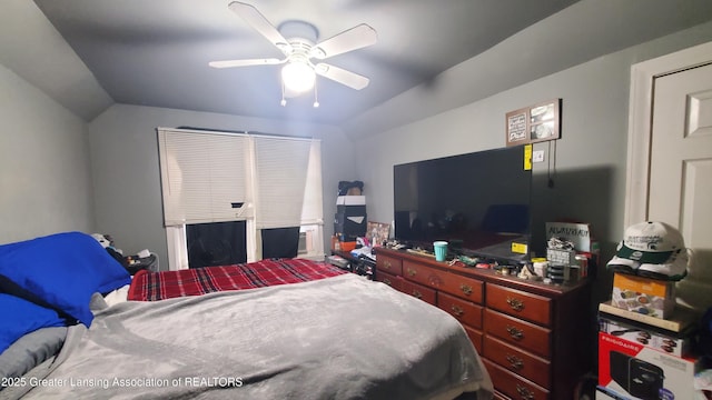 bedroom featuring vaulted ceiling and ceiling fan