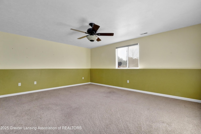 carpeted empty room with ceiling fan