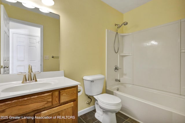 full bathroom featuring tile patterned flooring, vanity, tub / shower combination, and toilet