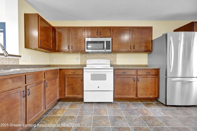 kitchen with sink and stainless steel appliances