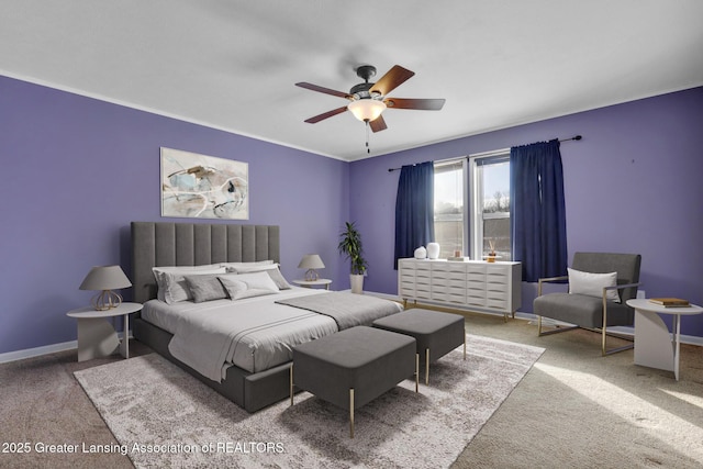 carpeted bedroom with ceiling fan