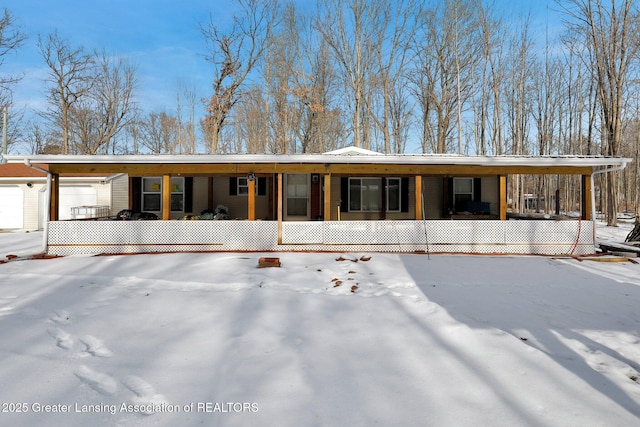1987 W Isabella Rd, Midland, MI 48640 - view of front of home featuring a carport