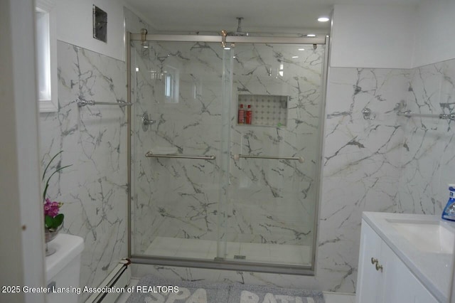 bathroom featuring vanity, tile walls, an enclosed shower, and toilet