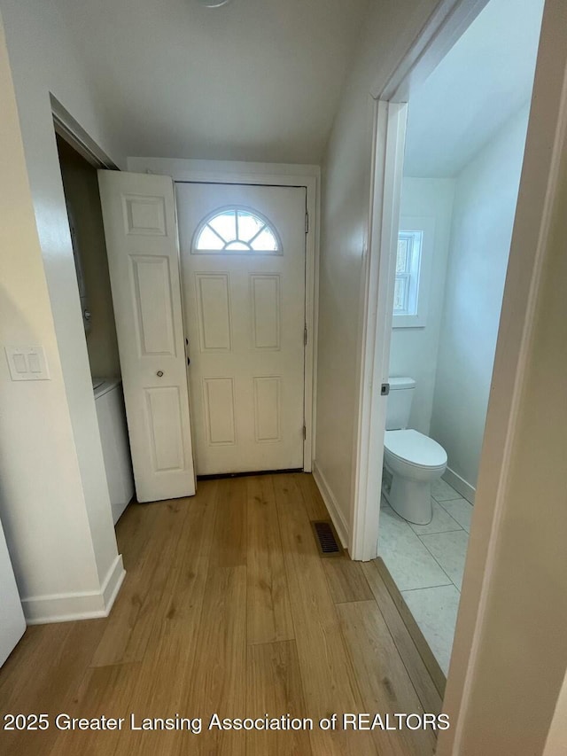 doorway featuring light wood-type flooring