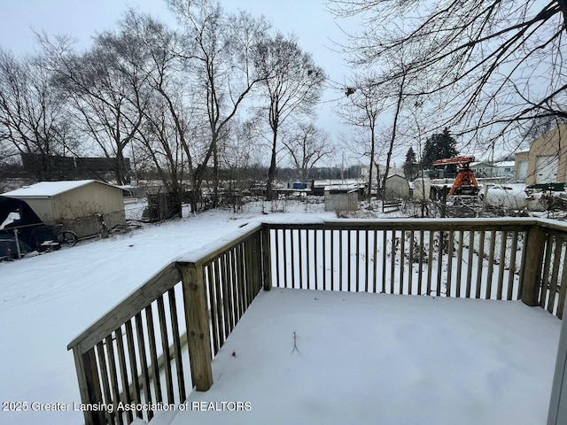 view of snow covered deck