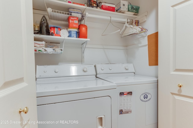 clothes washing area featuring separate washer and dryer