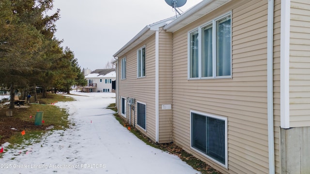 view of snow covered property