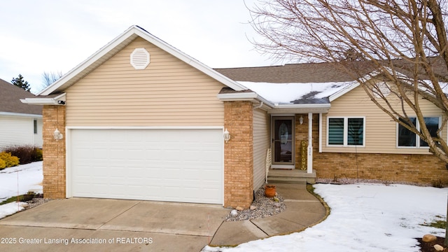 single story home featuring a garage