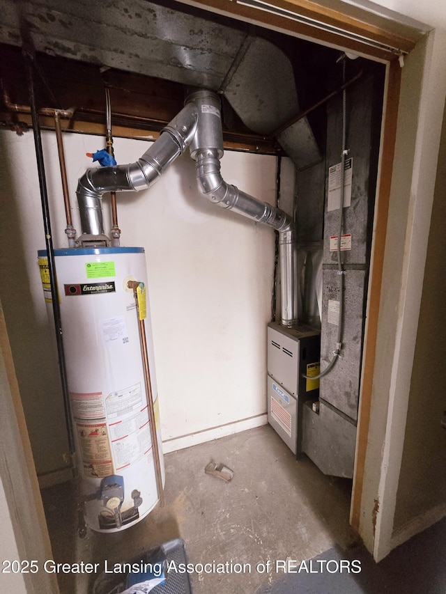 utility room featuring water heater