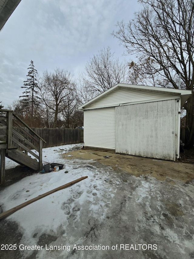 view of snow covered garage