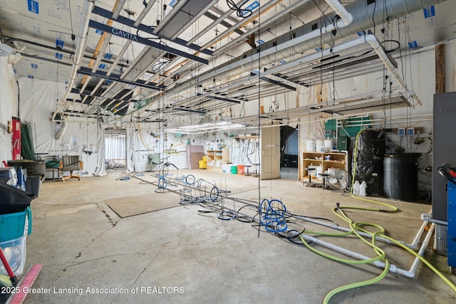 miscellaneous room with concrete flooring