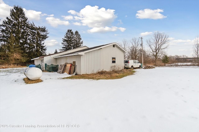 view of snow covered property