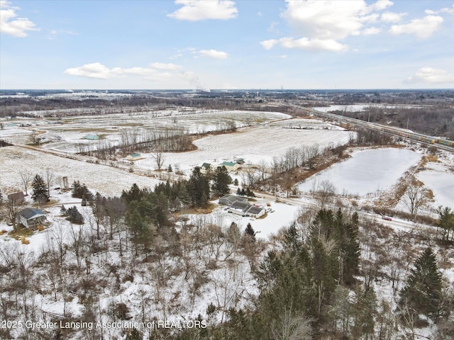 snowy aerial view with a rural view