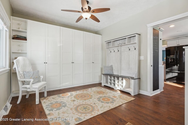 mudroom with dark hardwood / wood-style flooring and ceiling fan