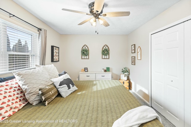 bedroom with a closet and ceiling fan