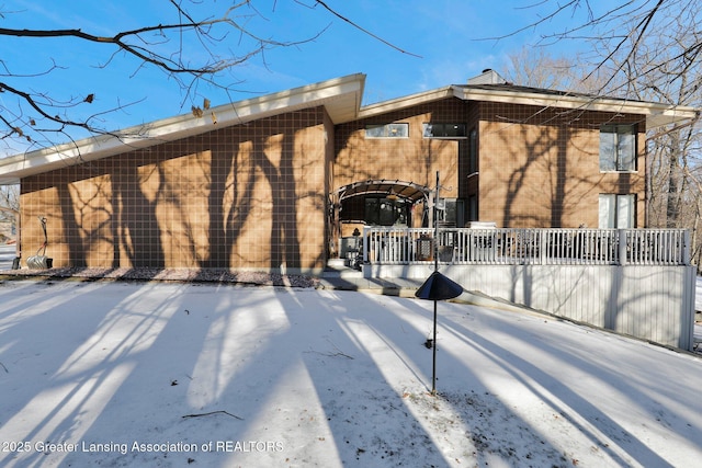 view of snow covered property