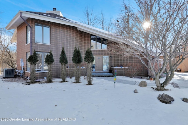 view of front of property with central AC unit