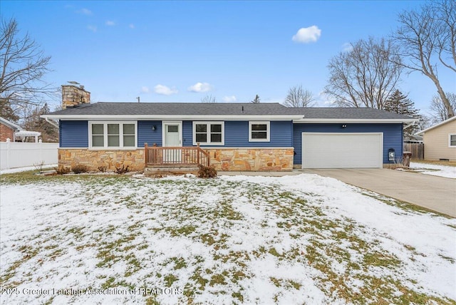 ranch-style house featuring a garage