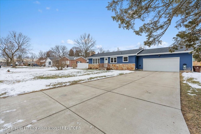 single story home featuring a garage