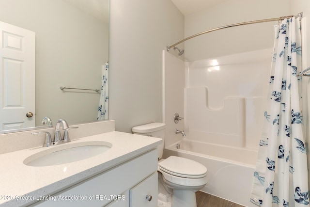 full bathroom featuring shower / tub combo with curtain, vanity, toilet, and wood-type flooring