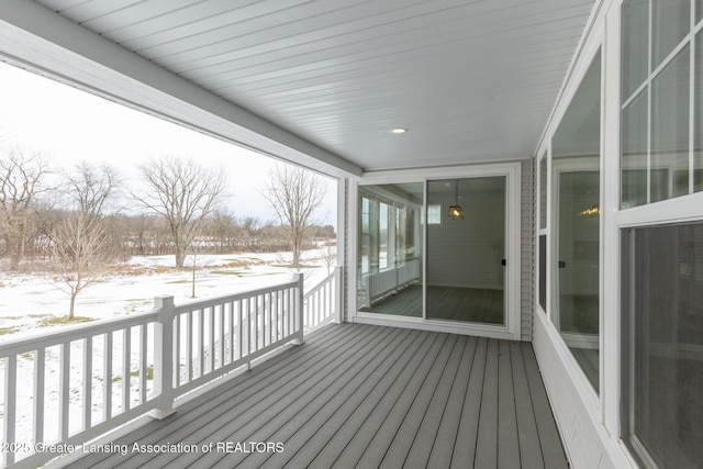 view of snow covered deck