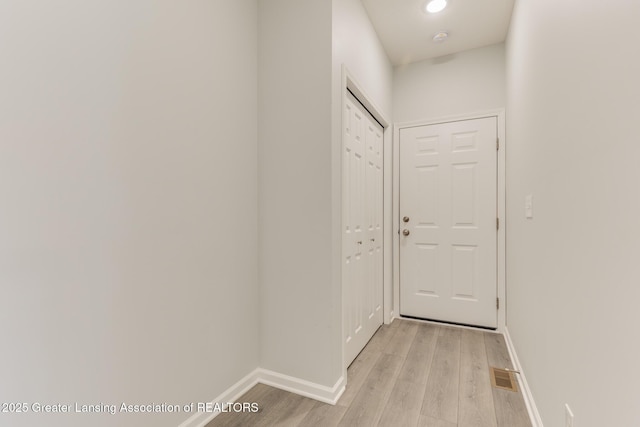 hall featuring light hardwood / wood-style floors