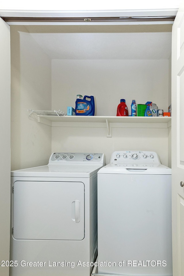 laundry area with washer and dryer