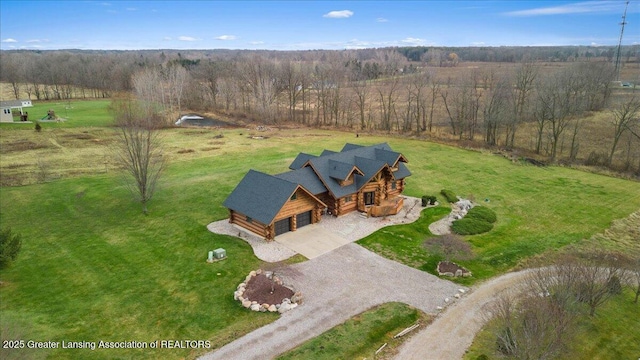 birds eye view of property featuring a rural view