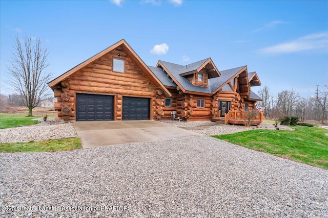 log-style house with a garage