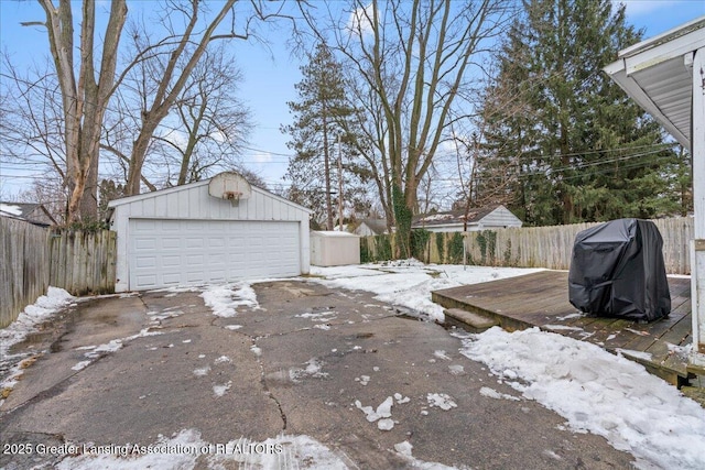 view of snow covered garage