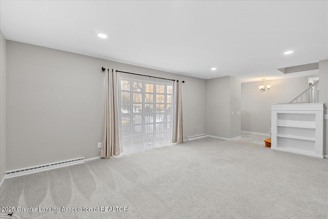 carpeted empty room featuring a notable chandelier, recessed lighting, baseboards, and a baseboard radiator