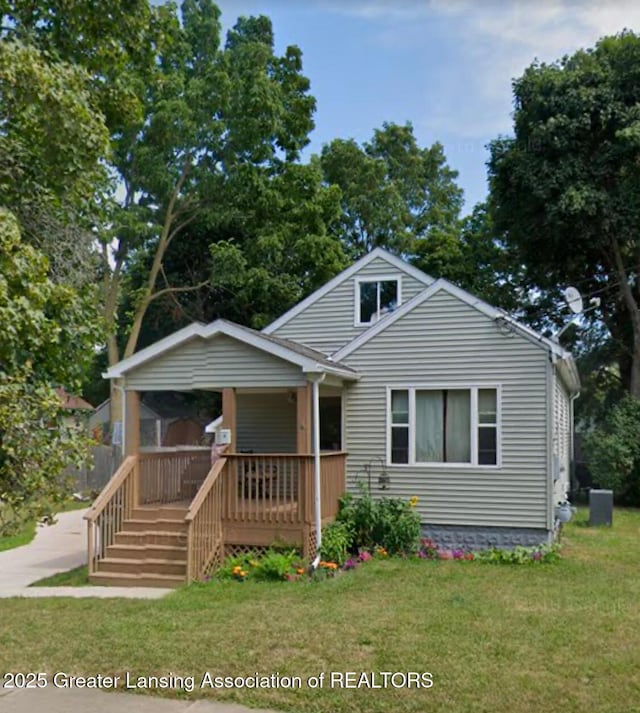 bungalow with a front yard